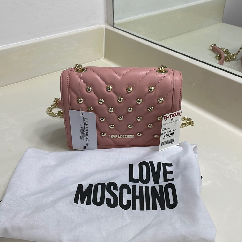 Brand new never been worn, beautiful bag, pink gold hardware Comes with dust bag